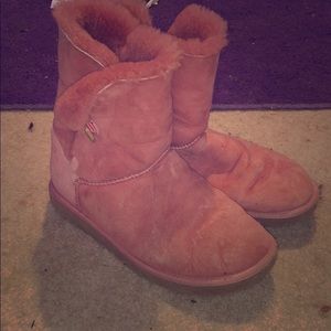 Pink ugg boots with wear but pink lining inside